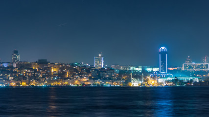 Night timelapse view of besiktas district in istanbul taken from asian part of the city.