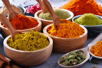 Variety of spices on kitchen table