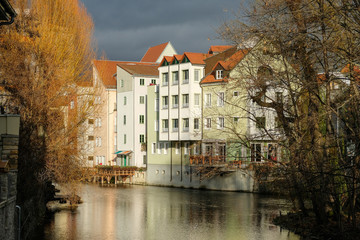 Obraz premium old town houses on a river