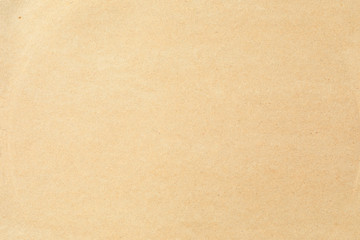 Fototapeta na wymiar Grainy old brown paper background texture