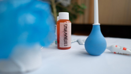 Coronavirus outbreak concept.Coronavirus diagnosis, laboratory testing to find and stop the spread of Wuhan coronavirus. Disease outbreak during the flu season. Protective medicines, pills, mask 