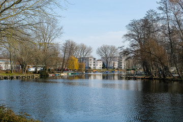 Fototapeta premium modern apartment buildings by the water in Berlin, Germany