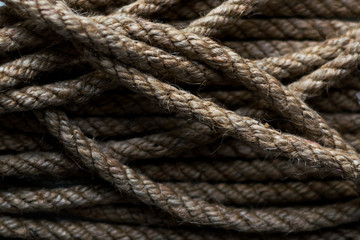 Fototapeta na wymiar natural eco-friendly thread gray brown wool rope ship twine texture background