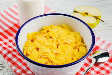 Delicious cornflakes on a red napkin.