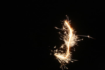 sparkler on black background