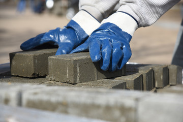 The builder takes the paving slabs.