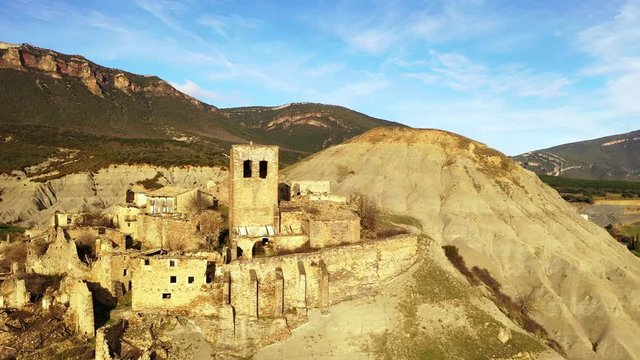 Esco abandoned village. Yesa reservoir area. Saragossa, Aragon, Spain. Europe. Aerial view. 4K.