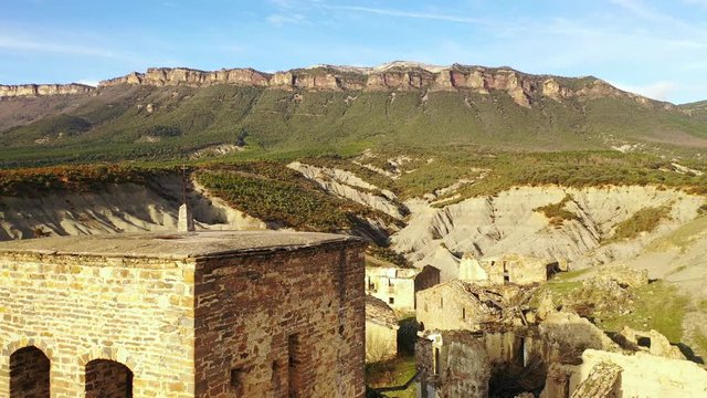 Esco abandoned village. Yesa reservoir area. Saragossa, Aragon, Spain. Europe. Aerial view. 4K.