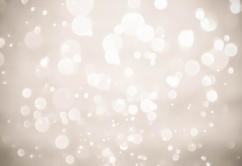 silver and white bokeh lights defocused. abstract background