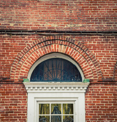 red brick wall and window