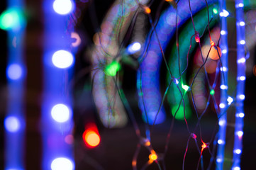 Fototapeta na wymiar New Year's illuminations in the form of a New Year's ball