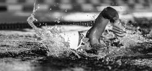 Female swimmer on training in the swimming pool