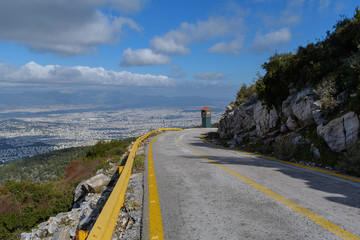 Hymettus (Ymittos) mountain road with yellow barriers