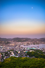 Fototapeta na wymiar Nagasaki city view in the evening from Mount Inasa Observation platform (Nagasaki, Japan)