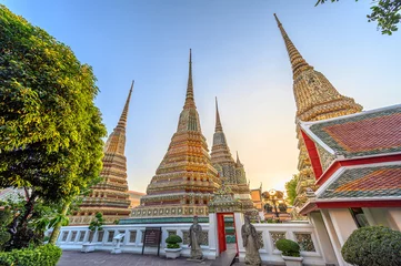 Fotobehang Wat Pho Temple, official name is Wat Phra Chetuphon Wimon Mangkhalaram Rajwaramahawihan, known as Temple of the Reclining Buddha located South of the Grand Palace (Bangkok, Thailand) © Chanawin