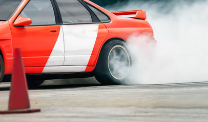 Race drift car burning tires on speed track © toa555