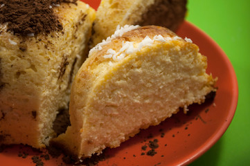 homemade cheesecake serving on red plate