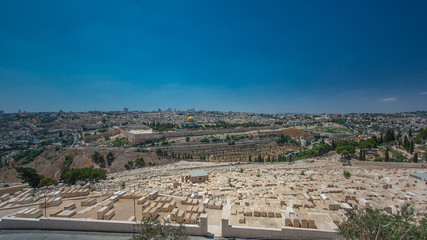 Fototapeta na wymiar Panoramic view on Jerusalem timelapse with the Dome of the Rock from the Mount of Olives.
