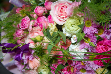 Beautiful wedding colorfull bouquet for bride. Beauty of colored flowers. Beautiful bunch of Gerbera flowers with white, red, pink and flowers . inside the bouquet of paper and white flowers .