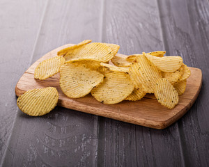 chips on a wooden Board