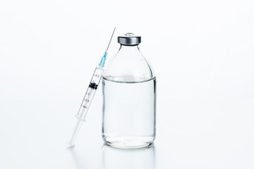Vaccination kit. Antibiotics in glass bottles, saline solution for drug dilution and a disposable syringe.