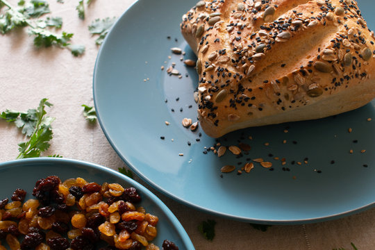 close up of paved bread with sesame seeds on a plate