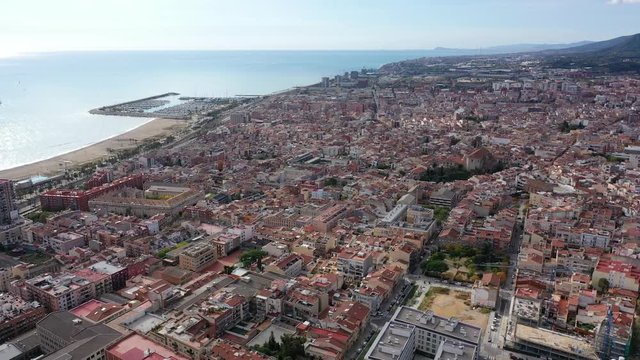 Scenic view from drone of large coastal Spanish town of Mataro on sunny winter day, Catalonia