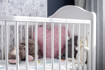 Fototapeta na wymiar Baby mattress and dolls in the bedroom