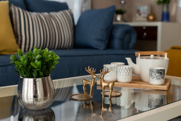 Tea cup set on the glass table in the living room
