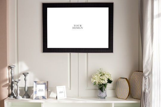 American style picture frame mock up on the wall with living room shelves