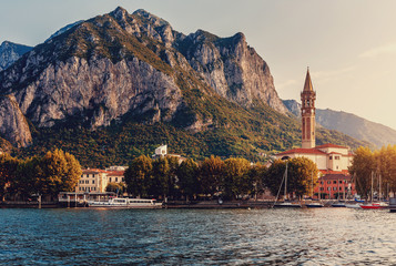 Fabulous sunset over the Lecco town. Italy, Europe. Fantastic summer sunrise on Como lake with...