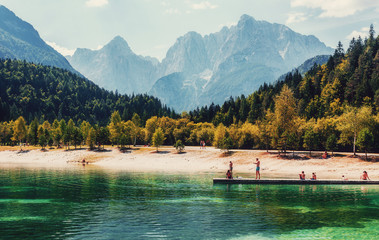 Wonderful landscape of Triglav National Park in sunny day. Scenic image of fairy-tale Jasna lake...