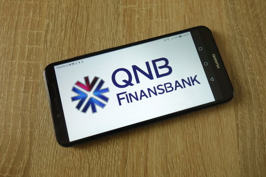 KONSKIE, POLAND - March 16, 2019: QNB Finansbank A.S. logo displayed on smartphone