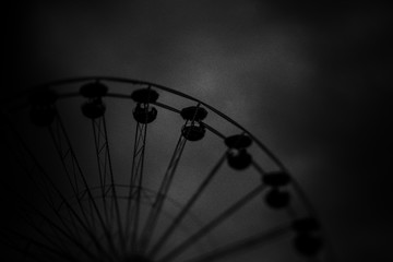 Minimal black texture background with funfair and sky
