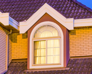 A window of a house at night in Vancouver, Canada.