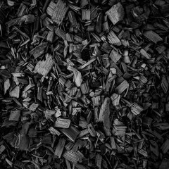 Minimal black texture background wood shavings
