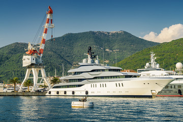 Naklejka premium Sunny view of luxury yacht at the port of Tivat, Montenegro.