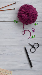 Background with knitting tools and accessories for starting a project