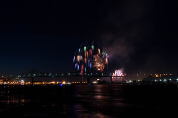 Fototapeta na wymiar fireworks. Jacques Cartier bridge with fireworks. Montreal Quebec. Fireworks.