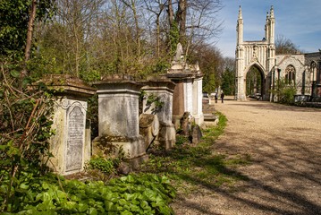 Headstones on graves in nunhead cemetery london, in england at daytime