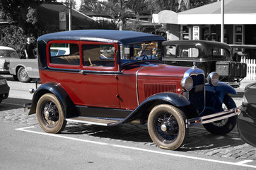 colorkey of old red vintage car with black top