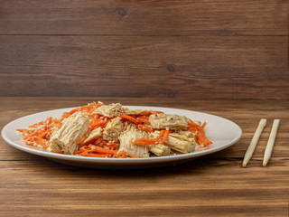 Spicy Chinese or Korean Yuba tofu bamboo and carrots salad on wooden background