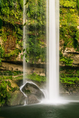 Long-exposure close-up on the beatiful Misol-Há waterfall in the lush green jungle near Salto del Agua, Palenque, Chiapas, Mexico.