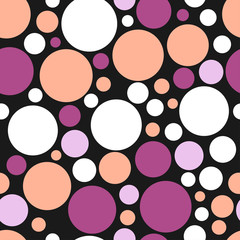 Light orange, pink and white round shapes of different sizes on black background. Seamless geometry disco pattern.