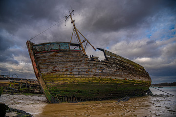 Wreck left to decay in the mud on the river Orwell