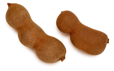 Tamarind tropical fruits. With shell and whole. Isolated on white background.