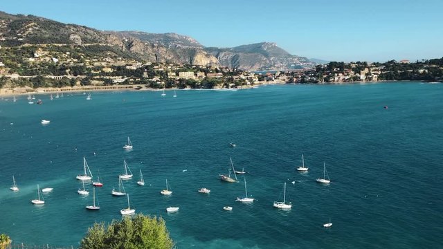 sailing ship, yachts at sea. Aerial view of sailboat at calm day. Landscape of harbor, port in Nice. Cote d'Azur France. Villefranche sur Mer, France. Seaside town on the French Riviera