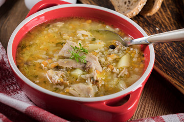 Barley soup with vegetables and chicken.