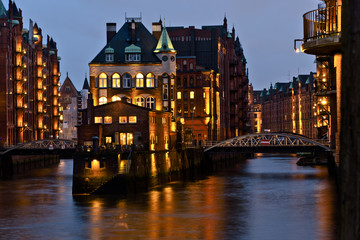 Fototapeta na wymiar Hamburg, Germany: Illuminated Wasserschloss (water castle)