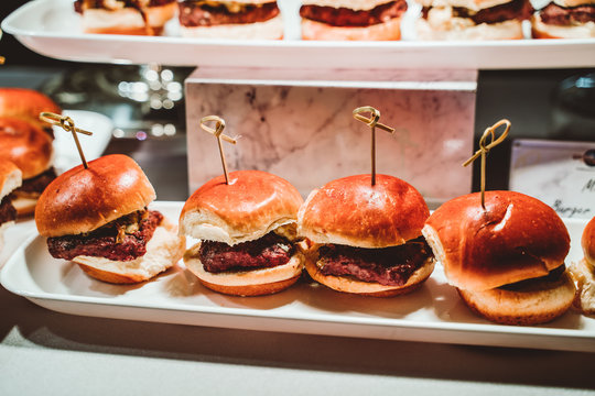 Mini Hamburger Sliders at Catering Table for Dinner